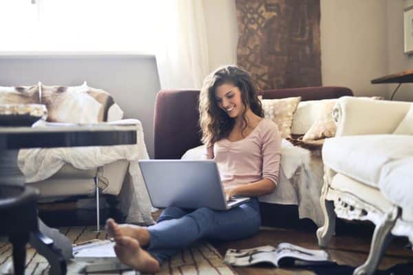 Smiling Woman on Laptop in Jackson, FL